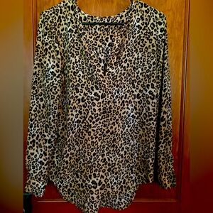 Brown and Black Animal print long sleeve blouse. V neck. Size Medium.